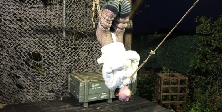 Muriel – head shaving upside down in a straitjacket suspension