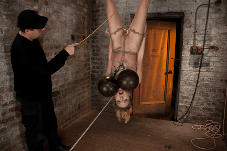 March’s Live Show 3/3: Zippered, severely flogged, 2 huge bowling balls hung offher pussy. Sexy!