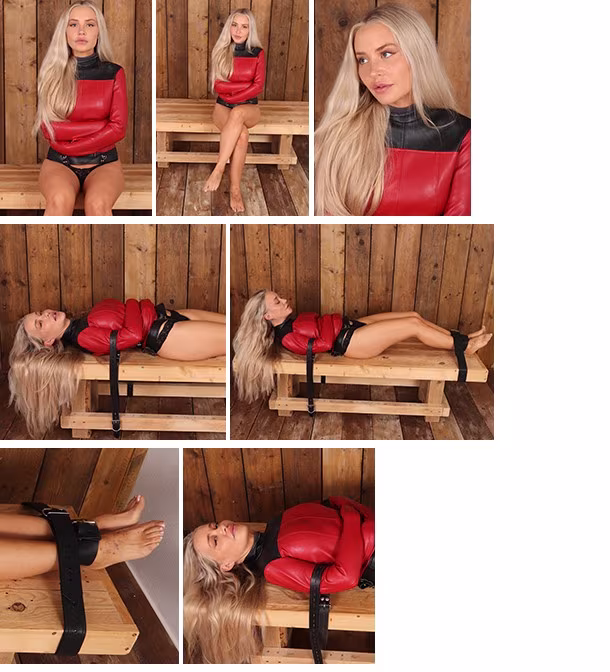 Aubrey strapped down in a straitjacket