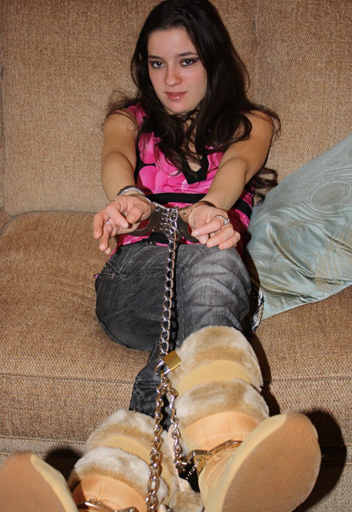 Kayla in hinged handcuffs