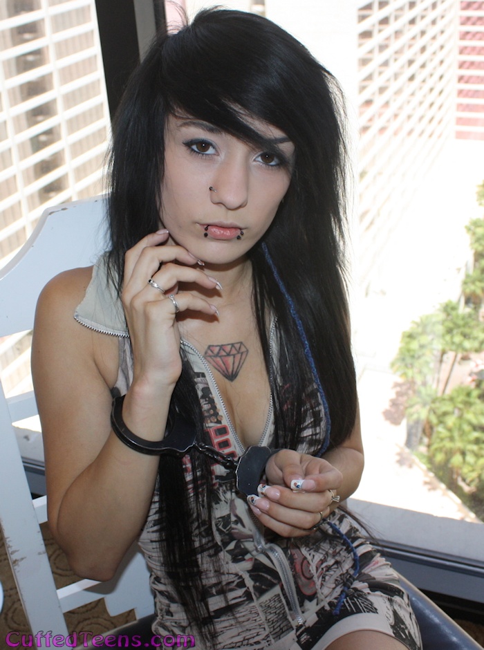Jessii in black cuffs
