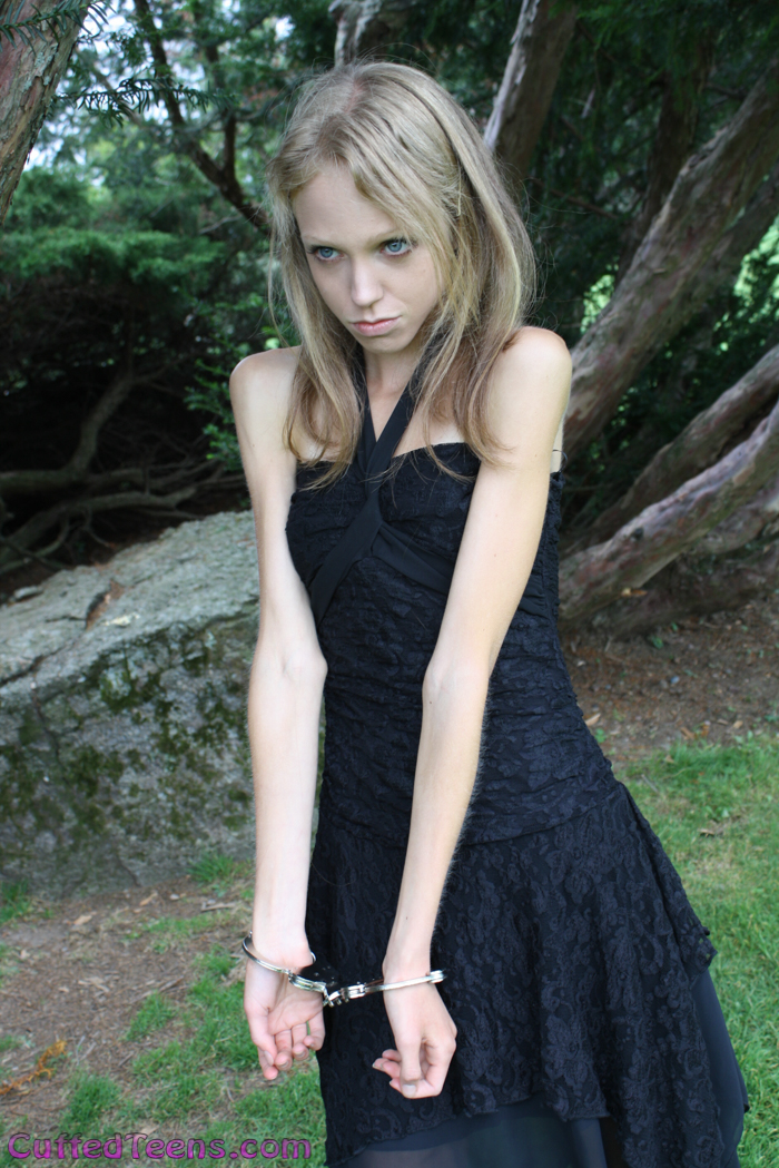 Young Bristol cuffed in the forest