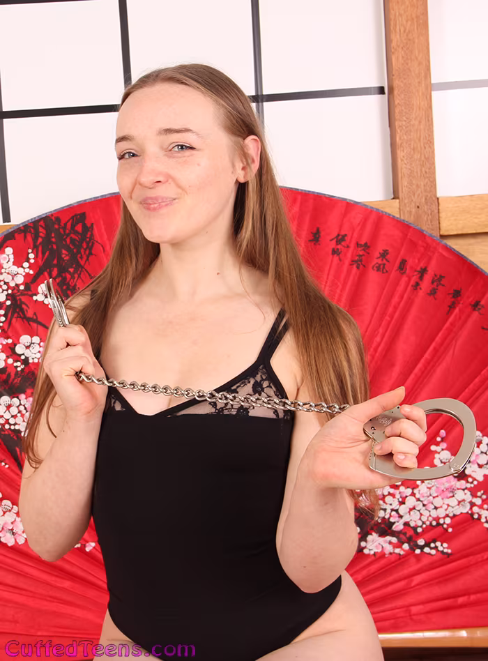 Captured Kerry toe cuffed