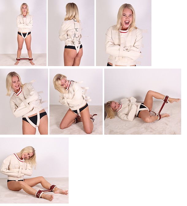 Darina Nikitina tries to escape from a straitjacket