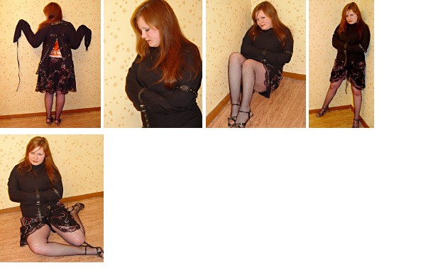 Dominic in a black canvas straitjacket