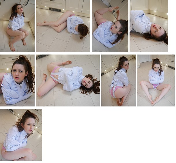 Lizzie Bayliss in a blue straitjacket