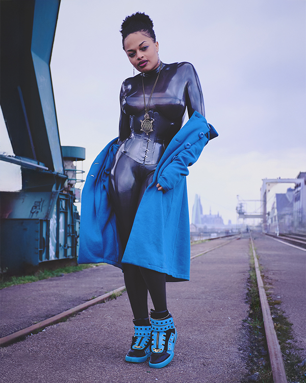 Shayna LáToya Xaria – Turquoise coat & latex