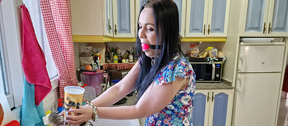 Cuffed and gagged in the kitchen