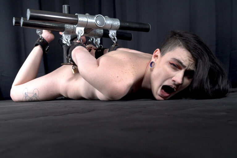 Trapped And Cuffed Under a Frame For Bondage Orgasms