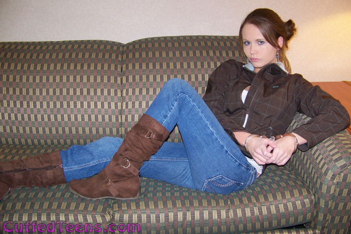 Gigi in hinged handcuffs