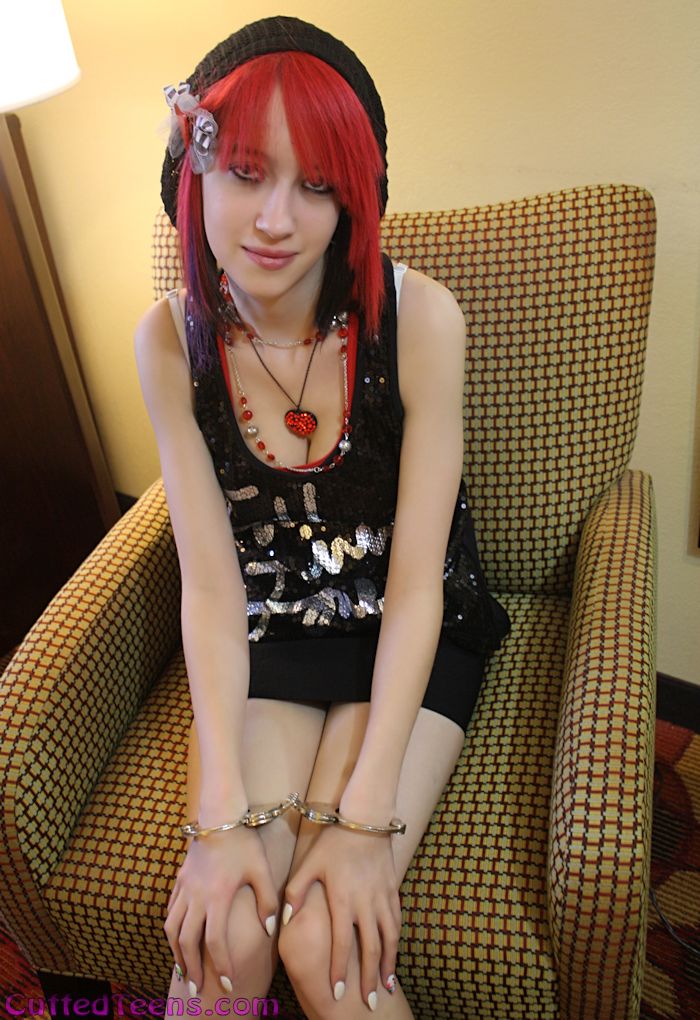 Tessa in hinged cuffs