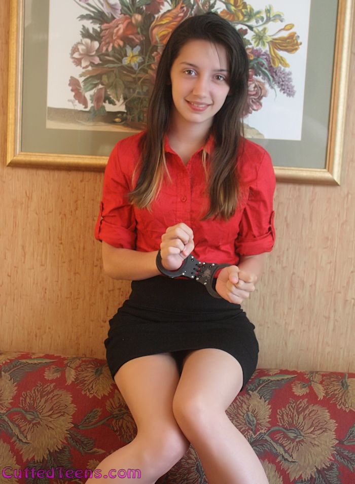 Kayla R in black hinged cuffs