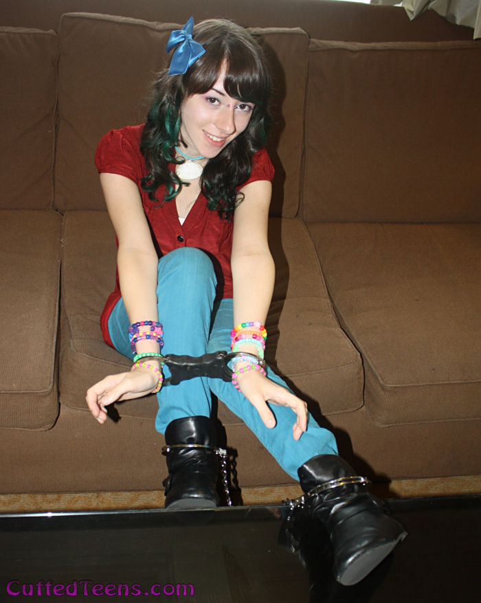 Allie in speedcuffs and leg irons